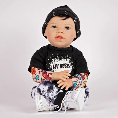 Paradise Galleries Reborn Toddler Boy Doll Lil' Rebel, 21 Inch With Black Rooted Hair And Blue Eyes, Made In GentleTouch Vinyl 1 Paradise Galleries Reborn Toddler Boy Doll Lil' Rebel, 21 Inch With Black Rooted Hair And Blue Eyes, Made In GentleTouch Vinyl